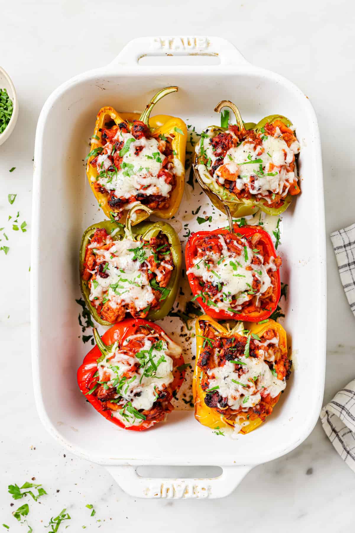 Baked ground turkey stuffed peppers with cheese