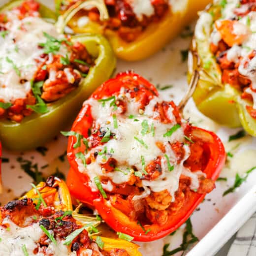 Close-up of ground turkey stuffed peppers in the baking dish