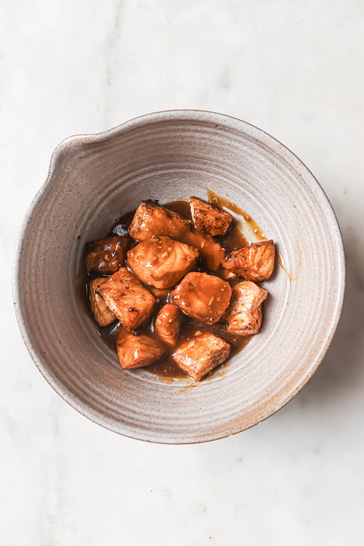 Salmon in bowl with glaze