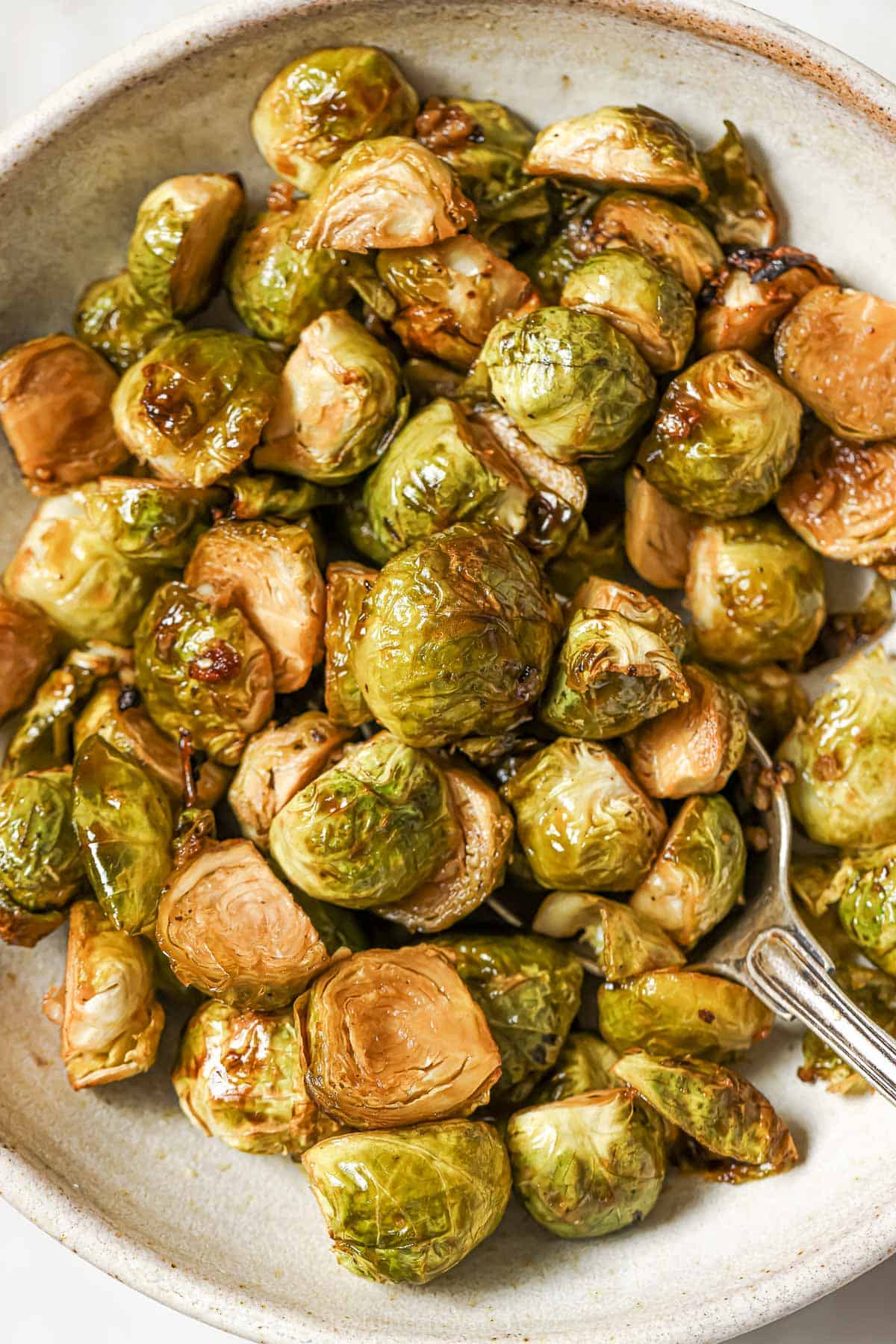 Overhead view of honey balsamic Brussels sprouts in bowl