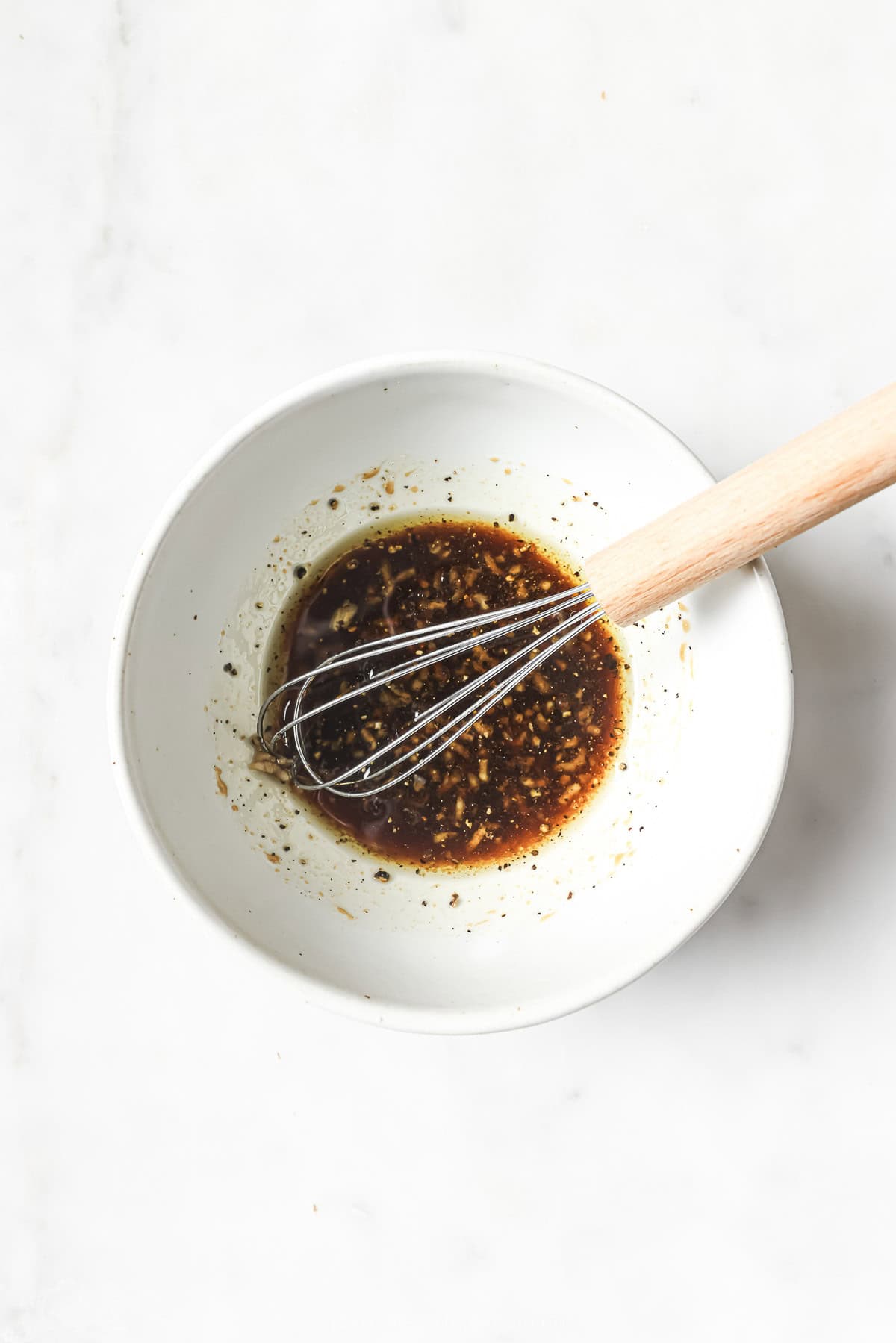 Sauce for honey balsamic Brussels sprouts in bowl