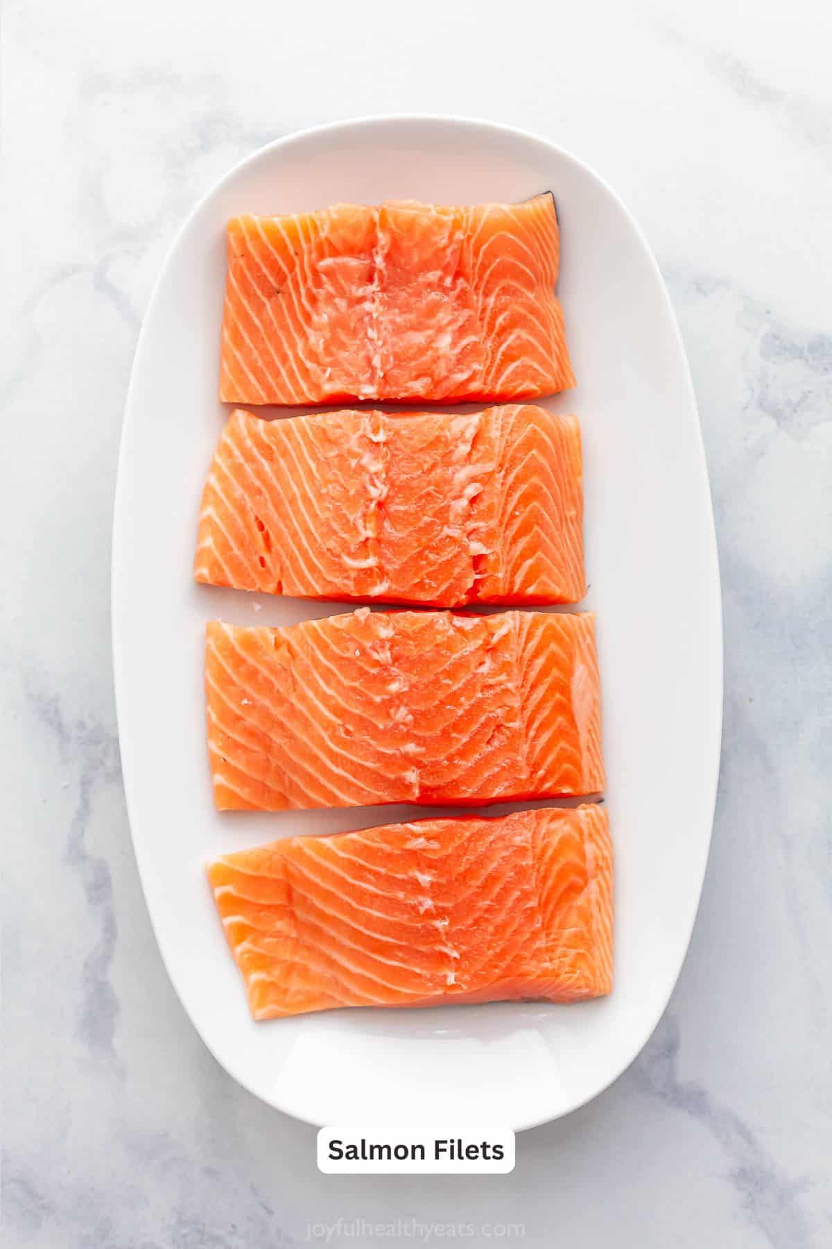 Overhead view of salmon filets on plate