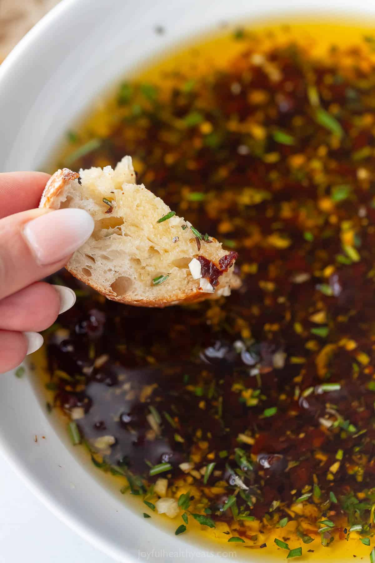 Piece of bread soaked in dipping oil