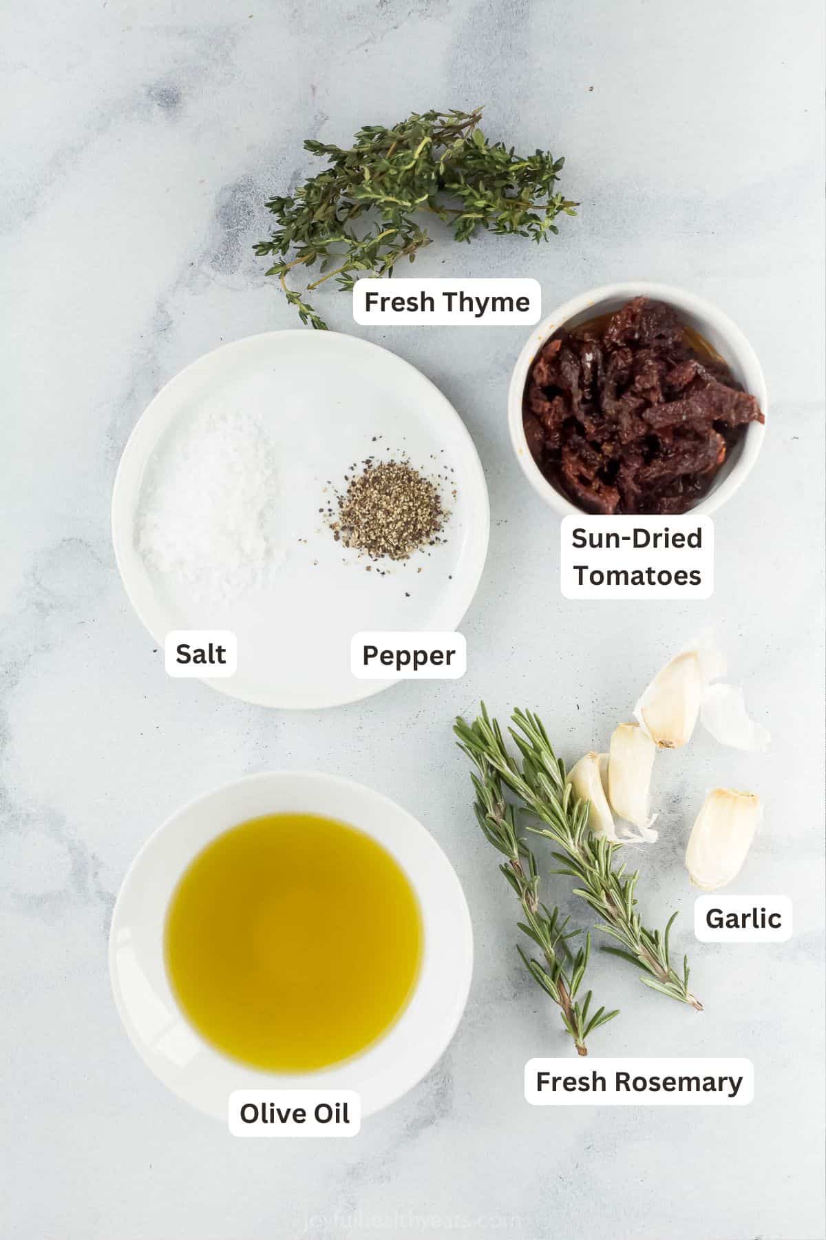 Overhead view of ingredients for bread dipping oil with labels