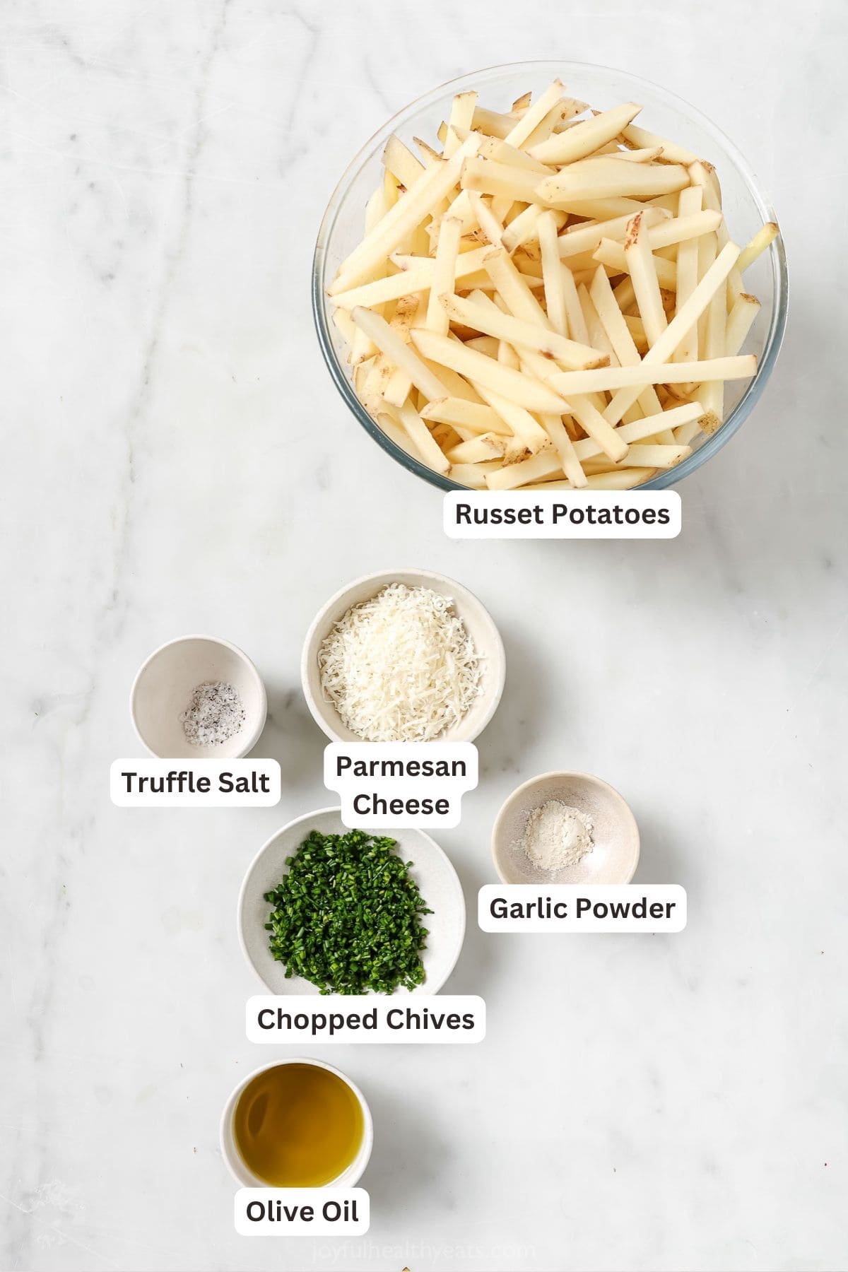 Overhead view of ingredients for Parmesan truffle fries
