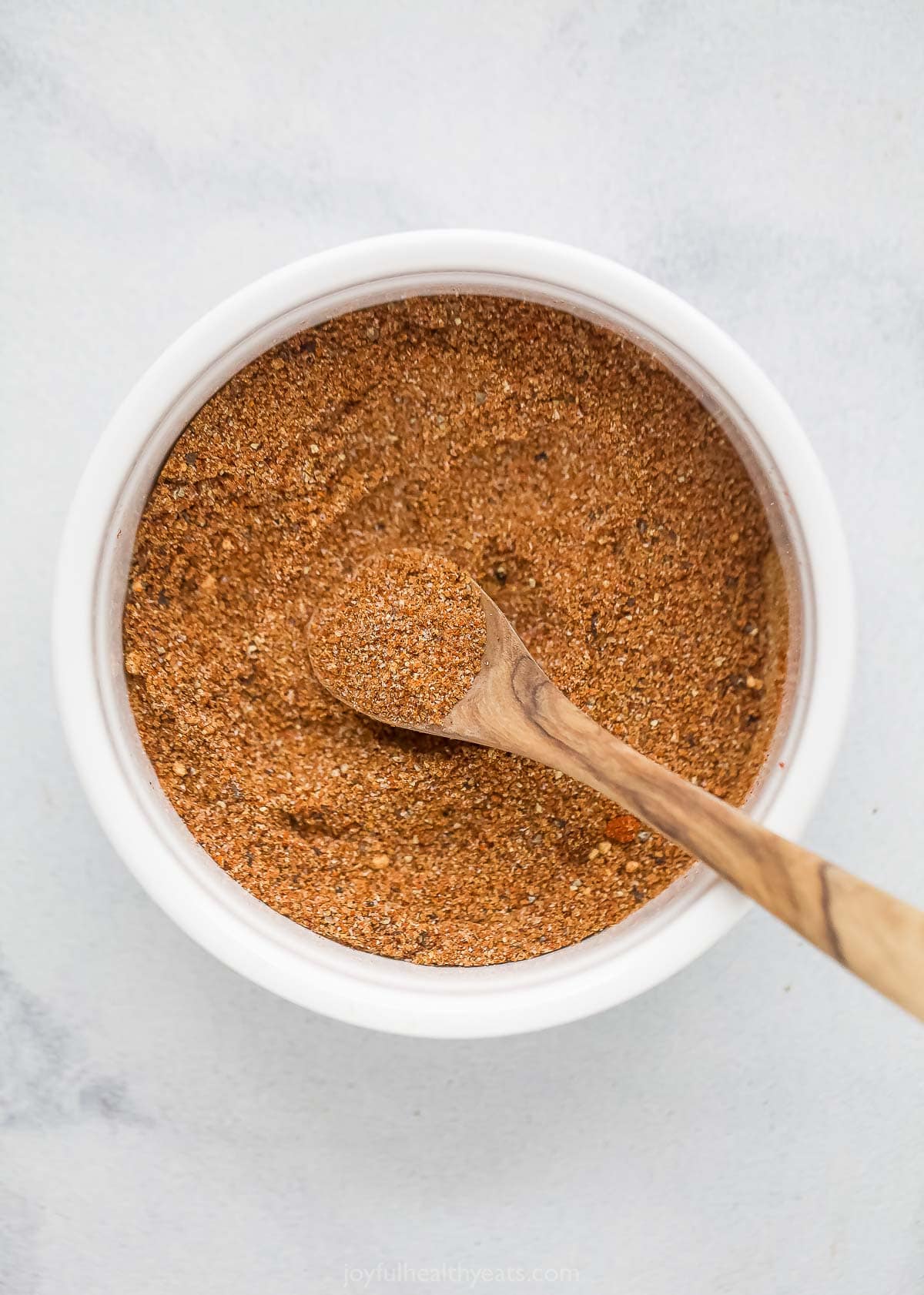 Spoonful of Buffalo chicken spice rub in bowl