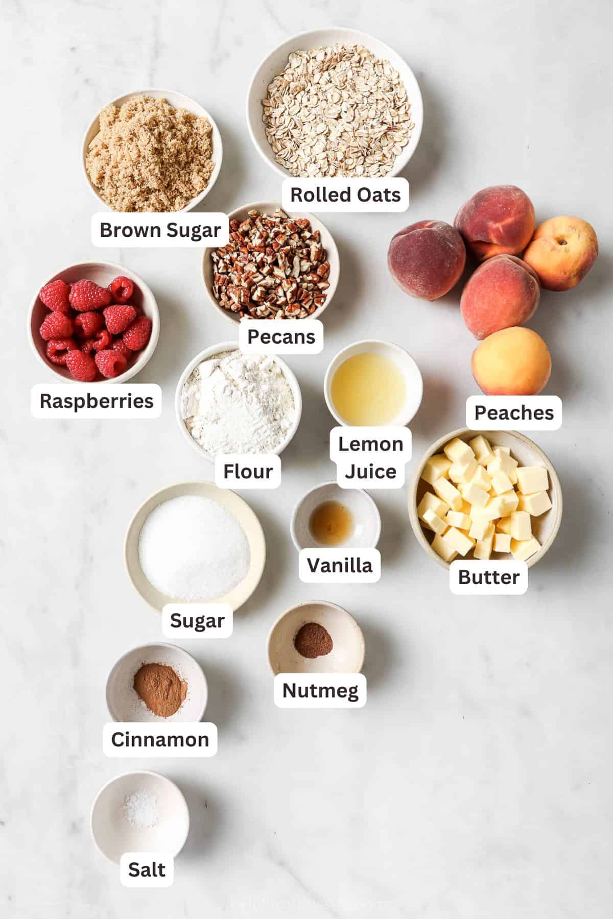 Overhead view of ingredients for raspberry peach crisp
