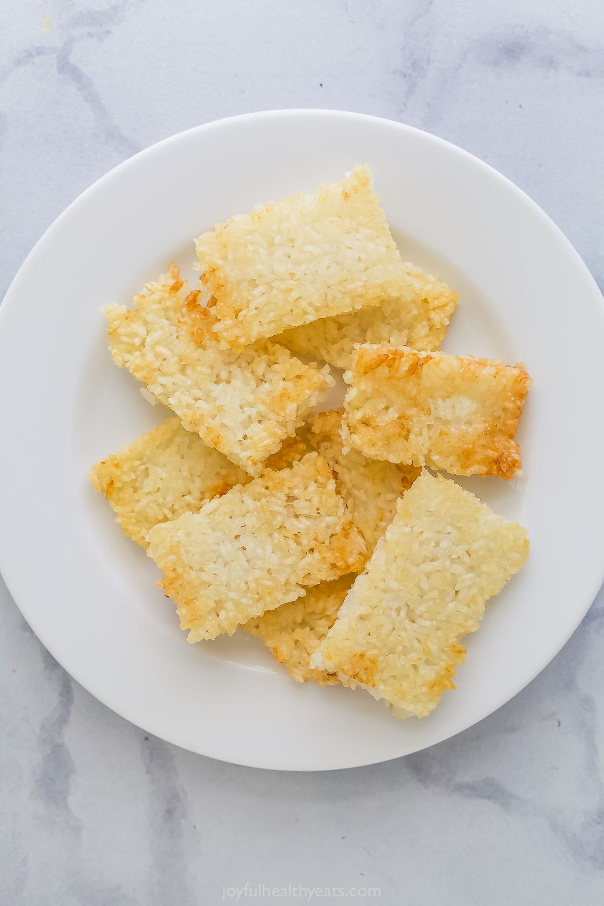 Crispy rice stacked on plate