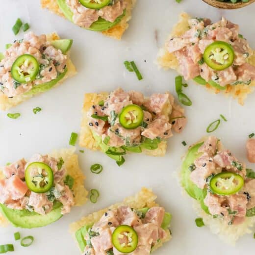 Overhead view of spicy tuna crispy rice bites on serving board