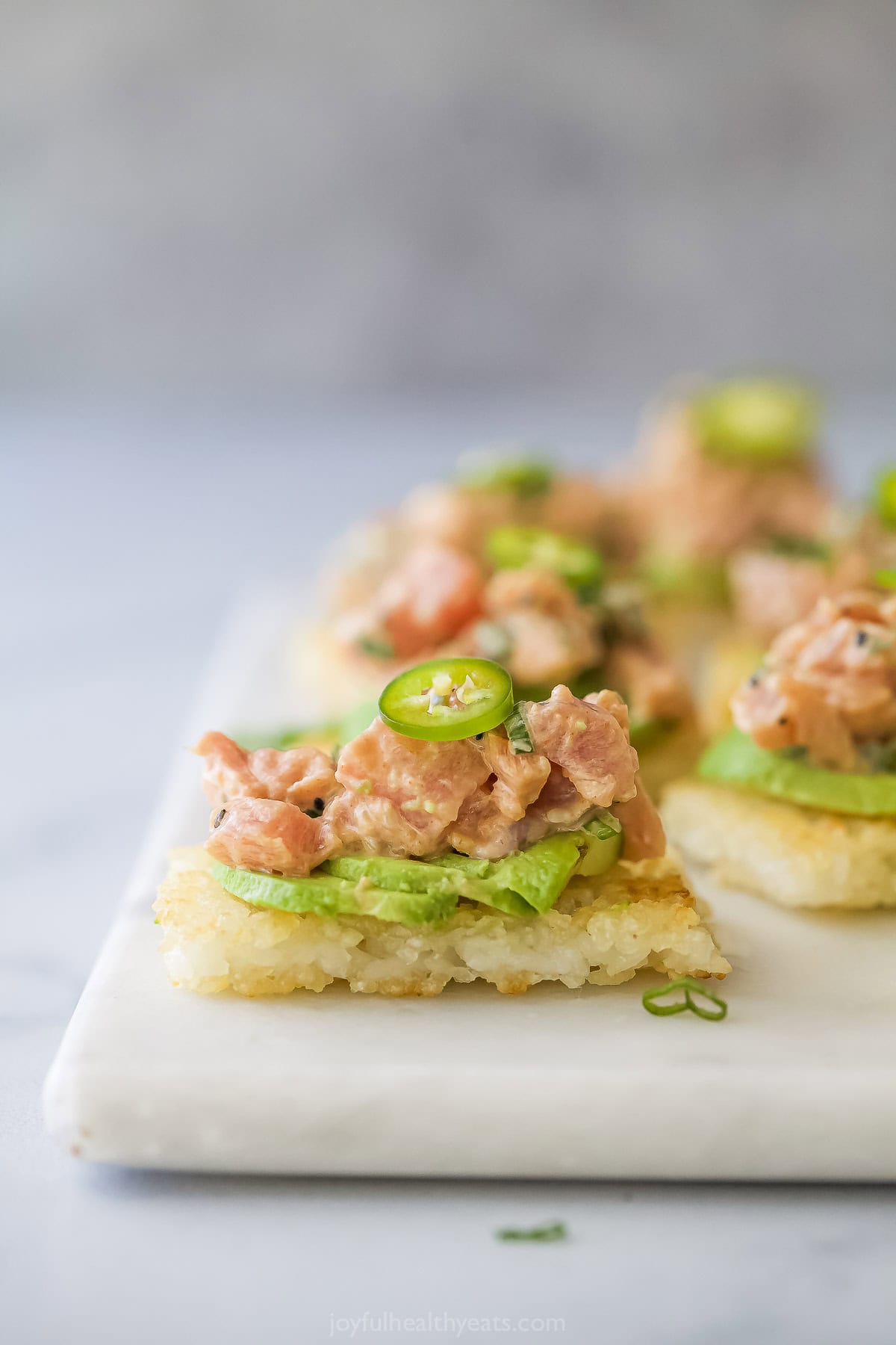 Copycat spicy tuna crispy rice bites on serving board