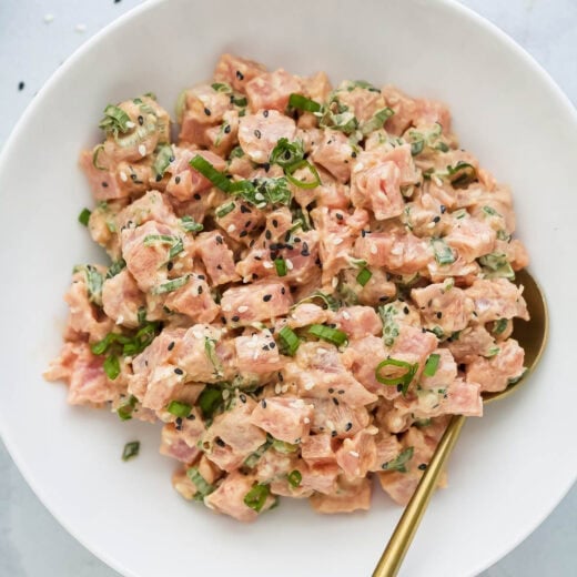 Bowl of spicy tuna with gold spoon